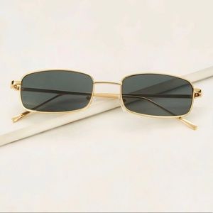 Gold framed sunglasses